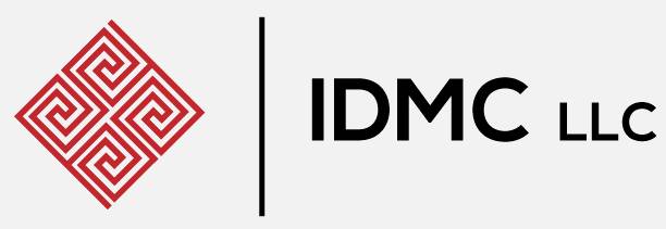 A black and white logo of idm